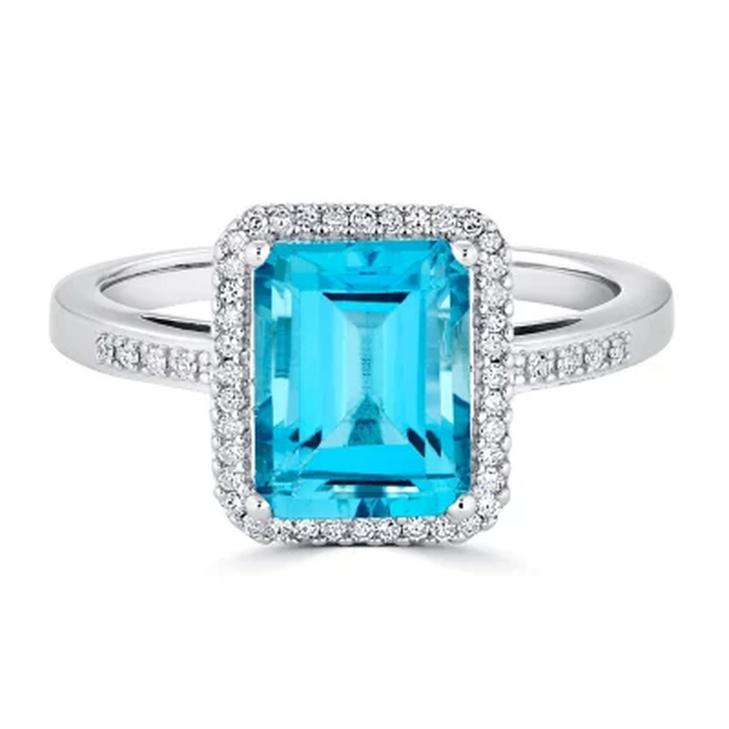 Blue Topaz and 0.14 CT. T.W. Diamond Ring in Sterling Silver