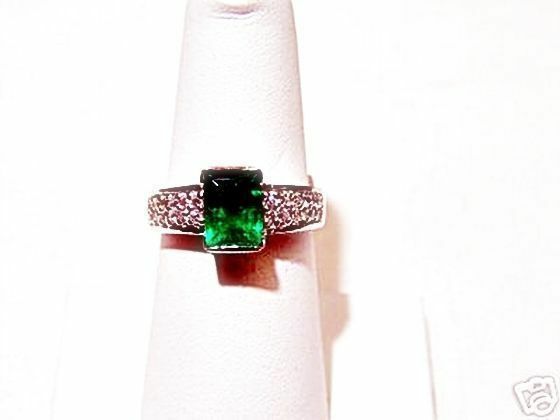 EMERALD CUT EMERALD 1.38 CT AND ROUND BRILLIANT CUT