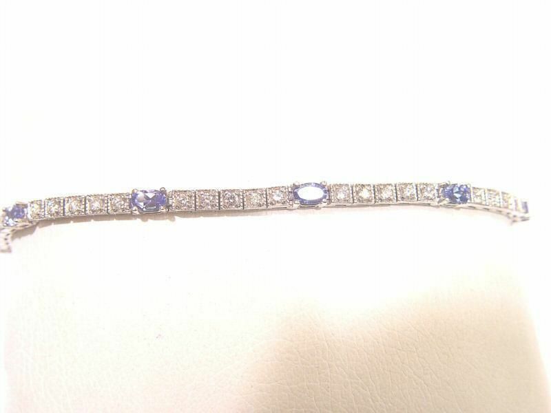 8 OVAL SHAPE TANZANITE 2.05CT WITH 40 ROUND BRILLIANT SH DIAMOND BOX SET 1.34 CT