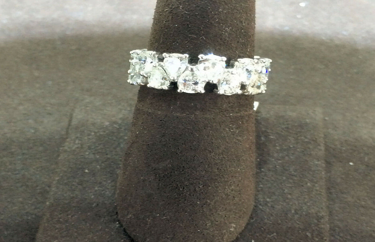 DIAMOND PEAR SHAPE SET ALTERNATING UP AND DOWN STYLE ALL THE WAY AROUND 18 K