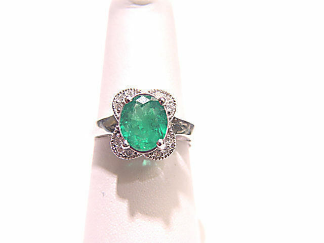 1.41 CT 1 OVAL EMERALD SET WITH ROUND BRILLIANT SHAPE DIAMOND .15 CT FLOWER RING