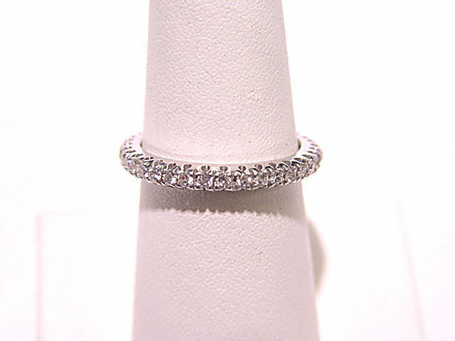 DIAMOND ARE PRONG SET ALL THE WAY AROUND ETERNITY BAND