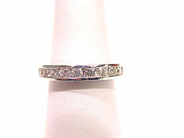 DIAMOND ARE SET ALL THE WAY AROUND THE BAND ETERNITY SET DIAMOND
