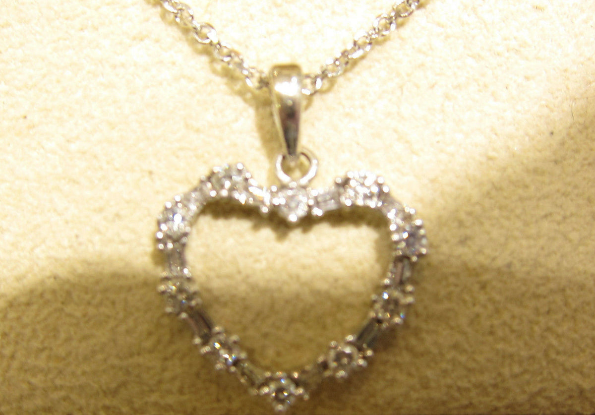 DIAMOND ROUND BRILLIANT SHAPE BAGUETTE SHAPE HEART PENDANT