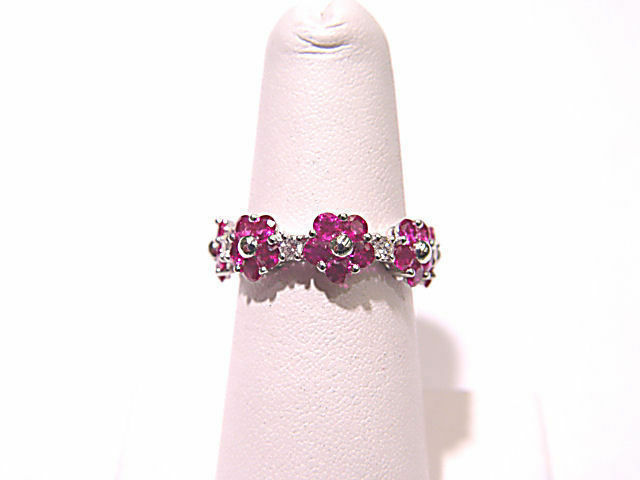 GEMSTONE ARE SET ALL THE WAY AROUND THE BAND ETERNITY BAND