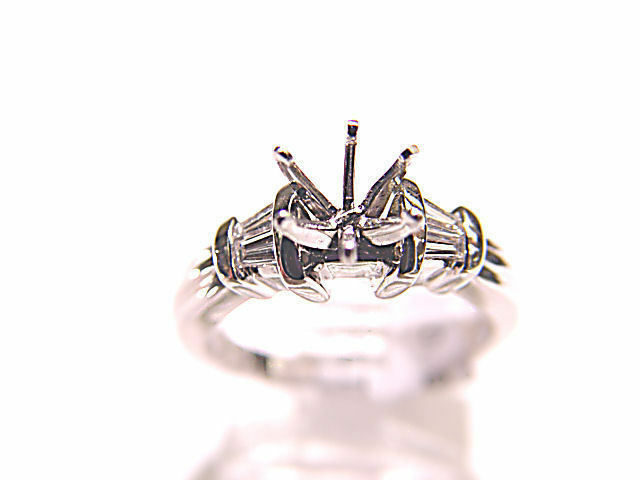 DIAMOND 4 TAPERED BAGUETTE SHAPE SETTING 6 PRONG