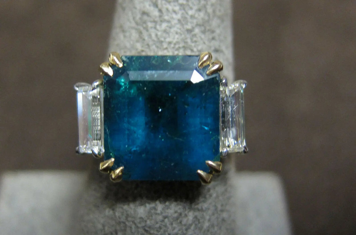 square emerald diamond 7.91 ct emerald shape side .86 ct set ring