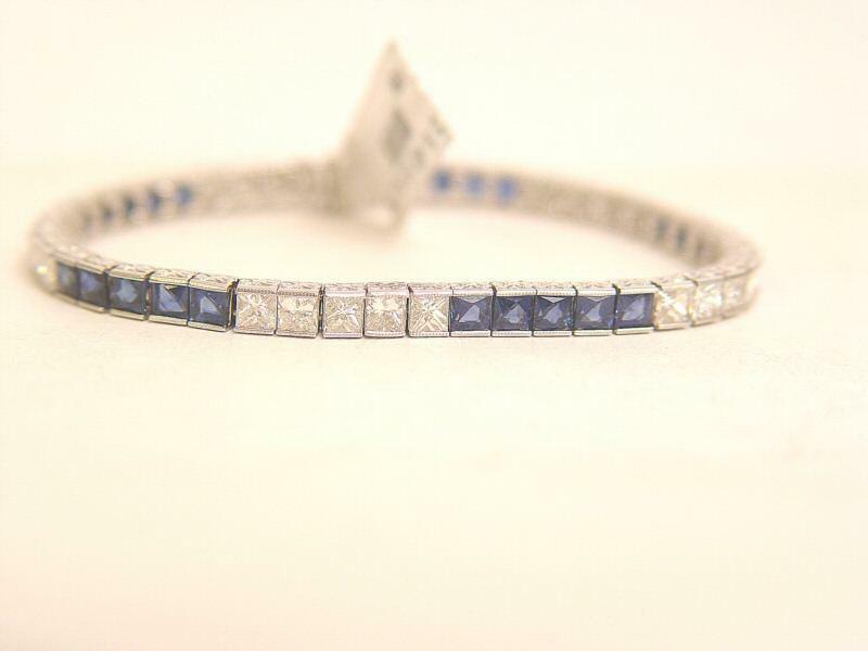 25 SQUARE SHAPE BLUE SAPPHIRE 6.72 CT 25 PRINCESS SHAPE DIAMOND 5.43 CT 18 K