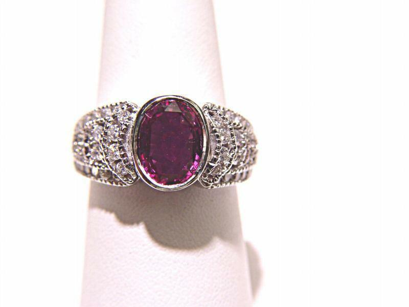 PINK SAPPHIRE OVAL CUT BEZEL SET 2.06 CT ROUND BRILLIANT SHAPE