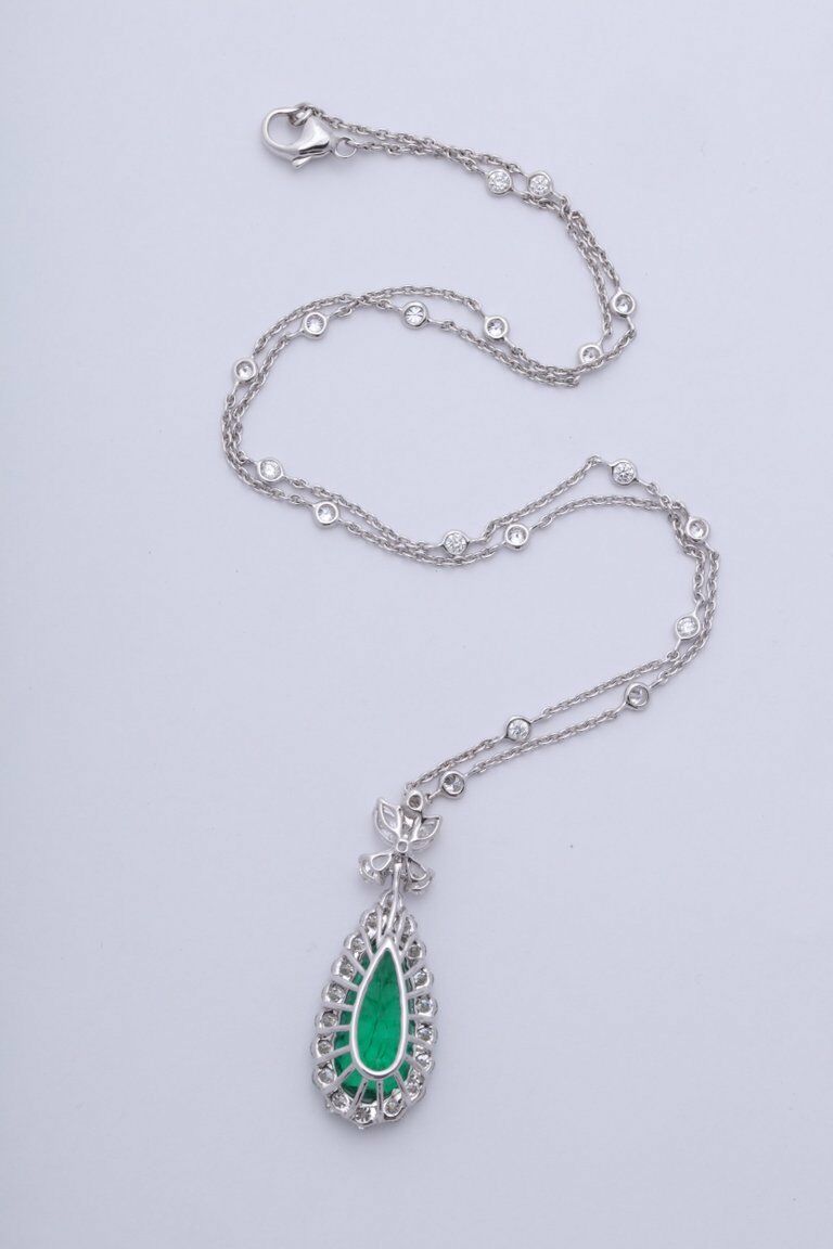 Emerald and diamond pendant. 5.23 carat green emerald lariette diamond necklace