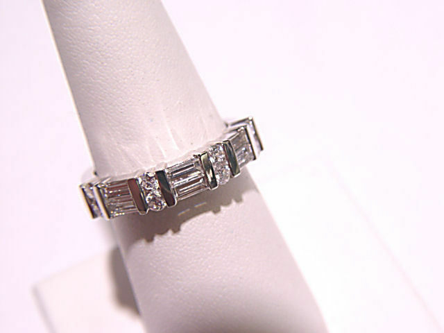 7 ROW DIAMONDS 8 ROUND BRILLIANT CUT AND 6 BAGUETTE CUT