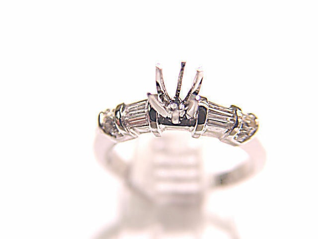 DIAMOND BAGUETTE ROUND BRILLIANT SHAPE SETTING 6 PRONG