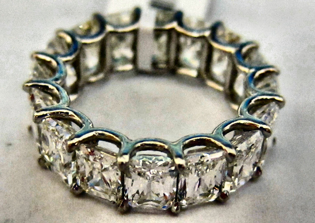DIAMOND SIXTEEN RADIANT SHAPE DIAMOND ETERNITY BAND 78 POINTERS DIAMOND BAND