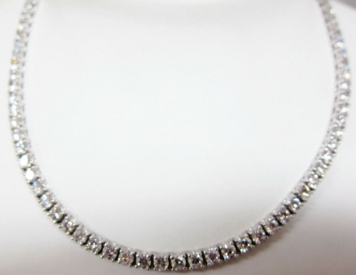 DIAMOND TENNIS NECKLACE 20 POINTERS SAME SIZE DIAMOND SET TO THE BACK