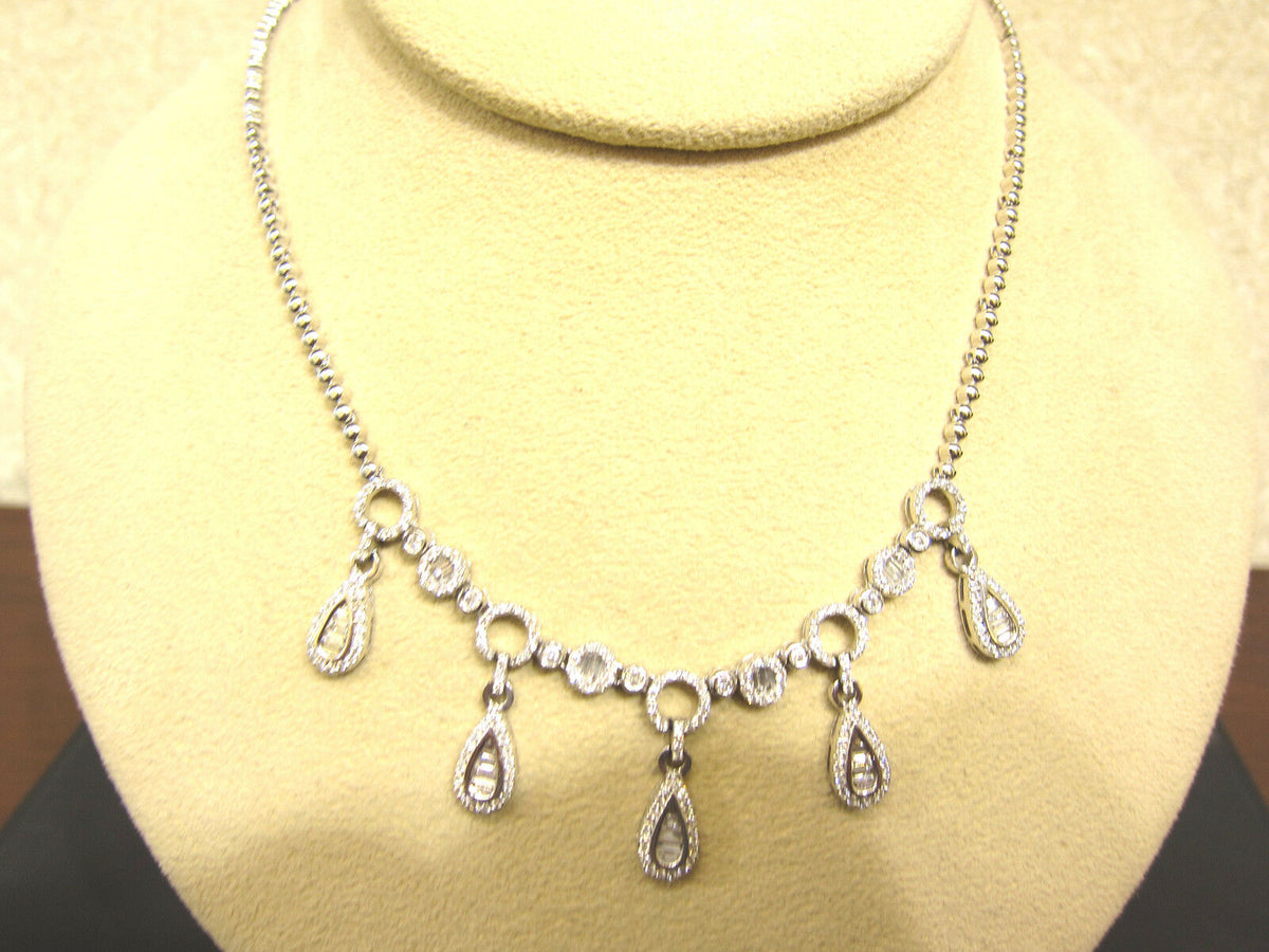 DIAMOND NECKLACE ROUND BAGUETTE FIVE PEAR OUTLINE DROP