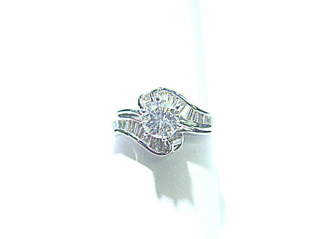 ROUND BRILLIANT SHAPE BAGUETTE SHAPE DIAMOND RING