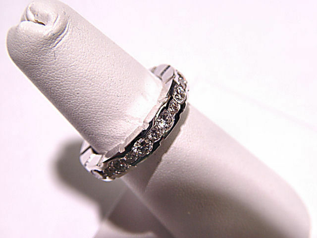 BIGGER THEN SMALLER DIAMOND ALTERNATING CHANNEL SET ETERNITY DIAMOND