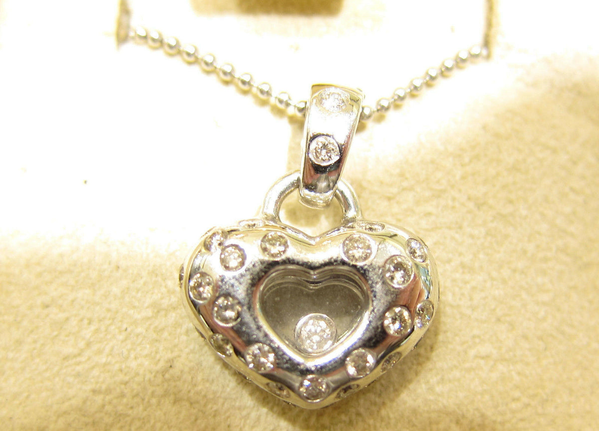 DIAMOND FLOATING ROUND BRILLIANT HEART SHAPE PENDANT