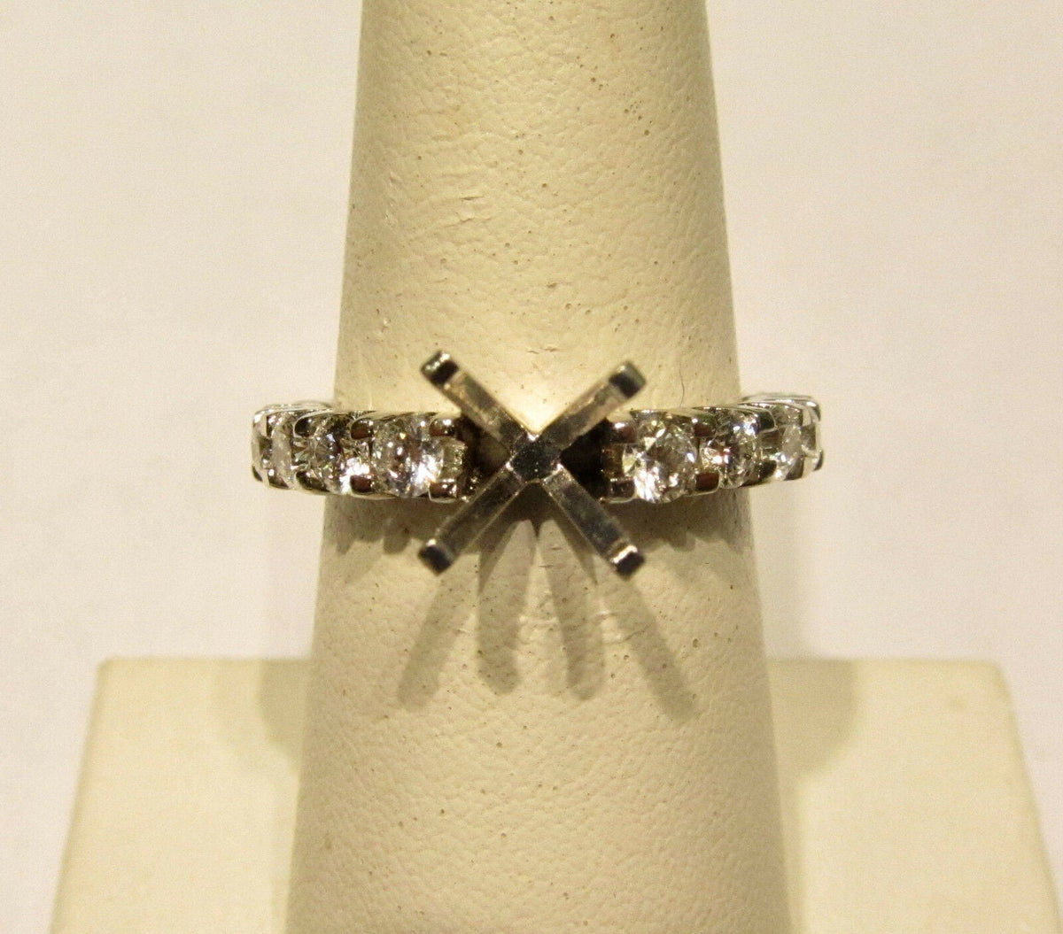 DIAMOND 18 ROUND BRILLIANT SETTING SMALL PORTION IN BACK FOR SIZE-ING
