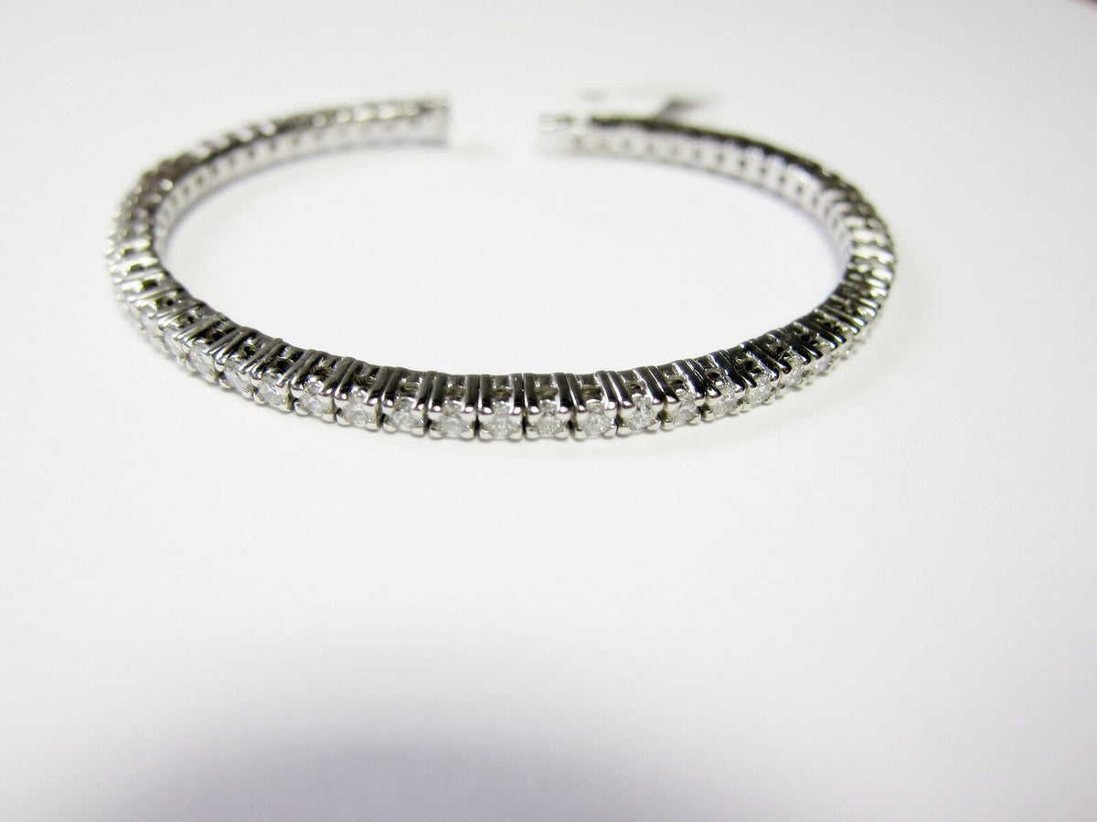 DIAMOND ROUND BRILLIANT SHAPE PRONG SET HALF WAY DIAMOND