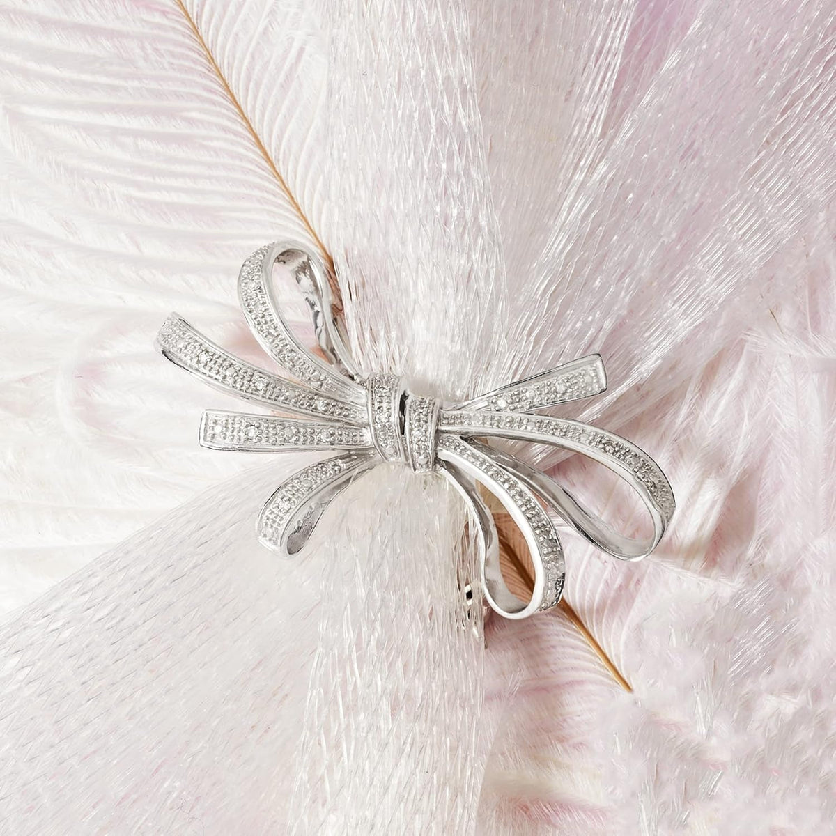 0.10 Ct. T.W. Diamond Ribbon Pin in Sterling Silver.