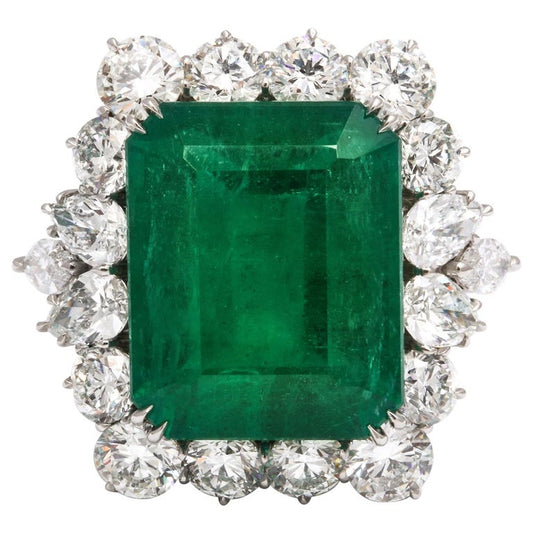 https://a.1stdibscdn.com/emerald-and-diamond-cocktail-ring-for-sale/1121189/j_114504121612595469694/11450412_master.jpg?width=768