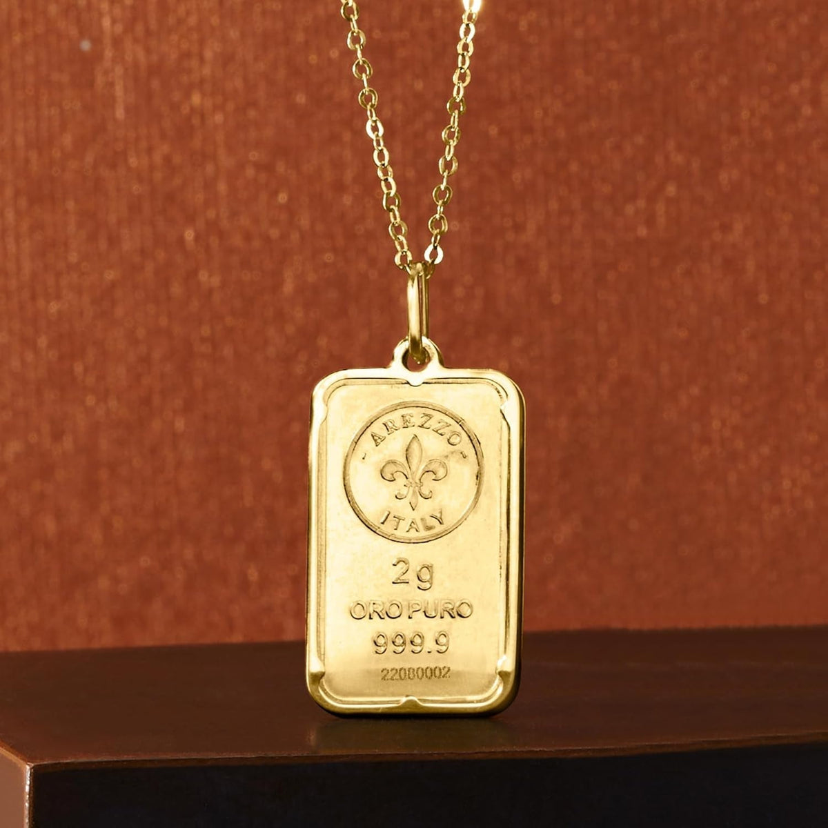 Italian 24Kt Yellow Gold Fleur-De-Lis 2-Gram Ingot Pendant Necklace with 14Kt Yellow Gold Frame. 20 Inches