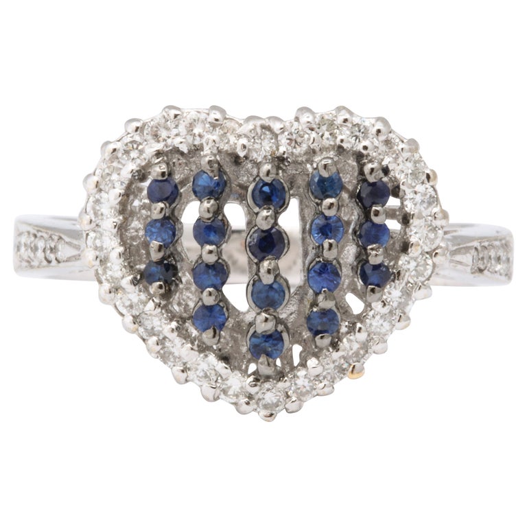 https://a.1stdibscdn.com/blue-sapphire-and-diamond-heart-ring-for-sale-picture-2/j_415/j_130857321629391603928/6R1A5018_master.jpg?width=768