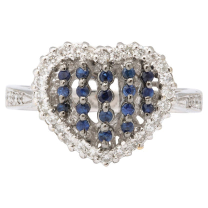 https://a.1stdibscdn.com/blue-sapphire-and-diamond-heart-ring-for-sale-picture-2/j_415/j_130857321629391603928/6R1A5018_master.jpg?width=768