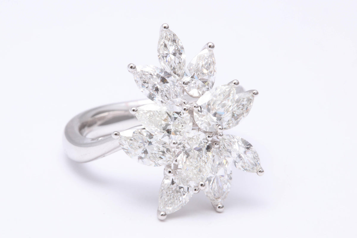 https://a.1stdibscdn.com/diamond-cluster-ring-for-sale-picture-2/0/j_50847211539355655660/6R1A9582_master.jpg