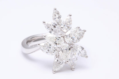 https://a.1stdibscdn.com/diamond-cluster-ring-for-sale-picture-2/0/j_50847211539355655660/6R1A9582_master.jpg