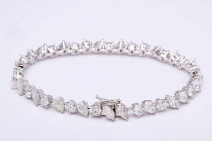 https://a.1stdibscdn.com/multi-shape-diamond-tennis-bracelet-for-sale-picture-3/0/j_57882221547578599576/6R1A3395_master.jpg