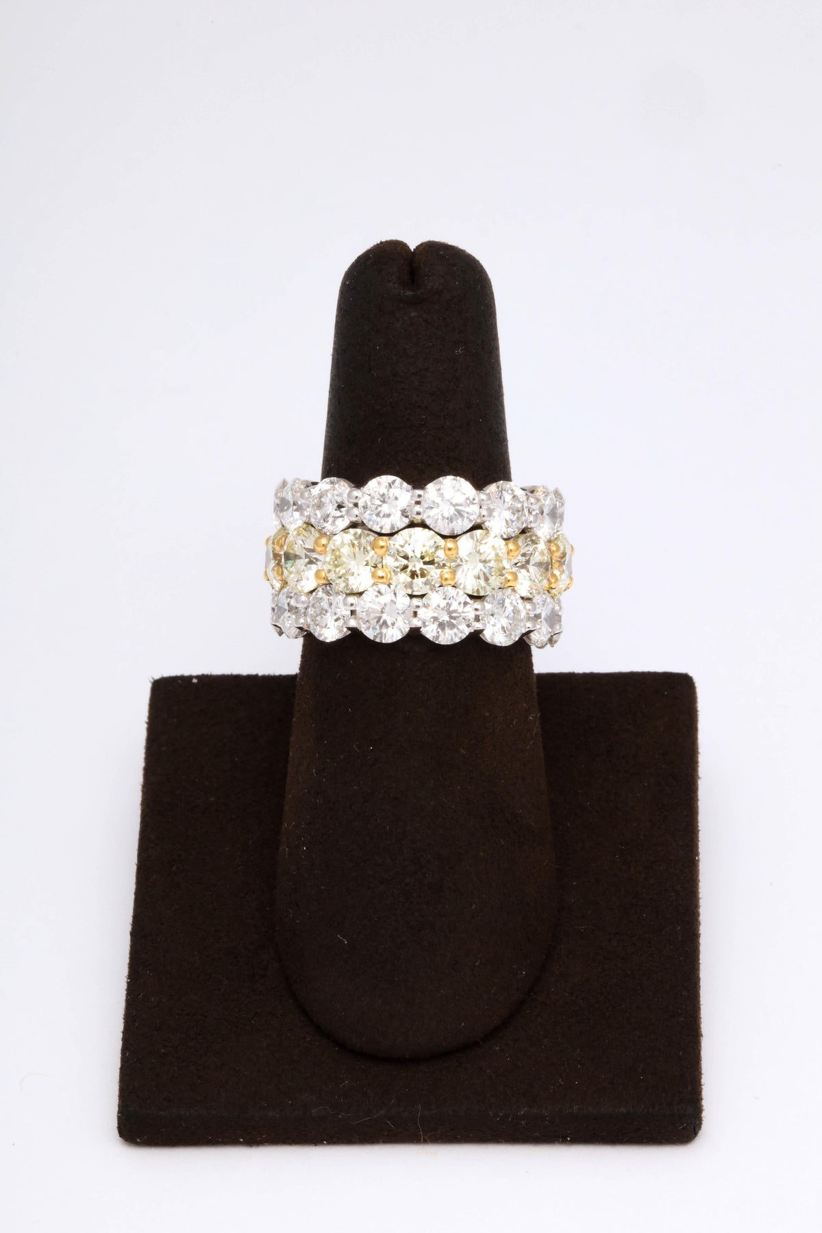https://a.1stdibscdn.com/yellow-and-white-diamond-wide-band-for-sale-picture-5/1722654/j_54006121546976590593/6R1A6920_org_master.jpg