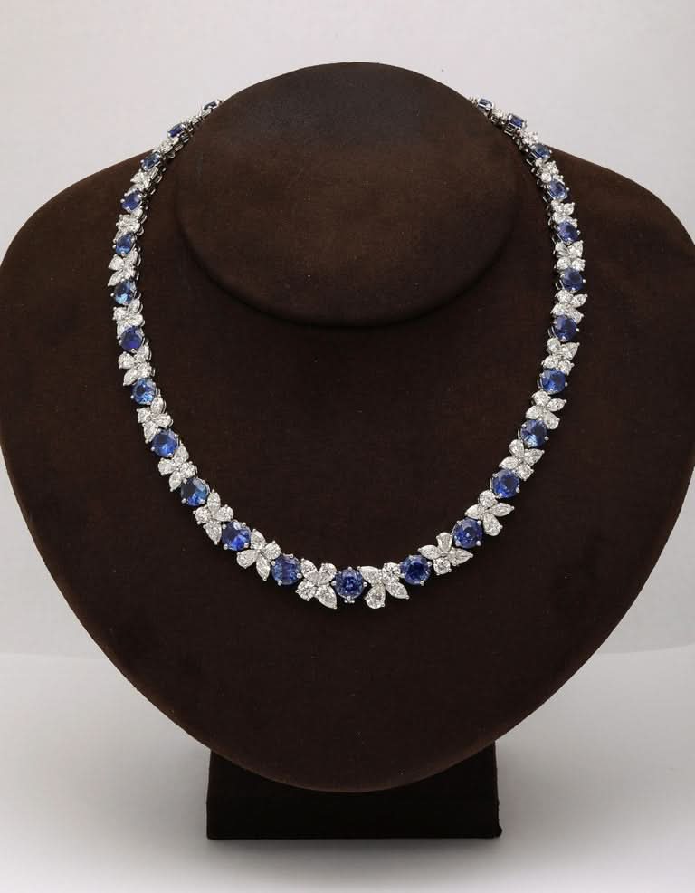 https://a.1stdibscdn.com/blue-sapphire-and-diamond-necklace-for-sale-picture-5/j_415/j_227289521714486587720/2P6A1550_master.jpg?width=768