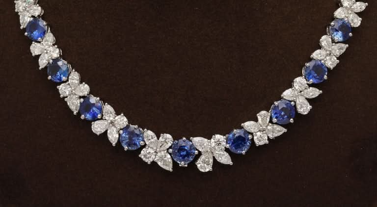 https://a.1stdibscdn.com/blue-sapphire-and-diamond-necklace-for-sale-picture-7/j_415/j_227289521714486587771/2P6A1552_master.jpg?width=768