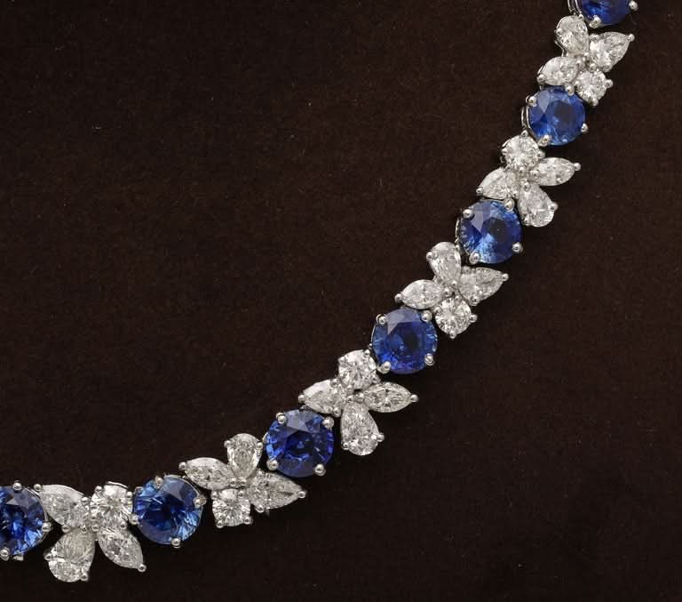 https://a.1stdibscdn.com/blue-sapphire-and-diamond-necklace-for-sale-picture-9/j_415/j_227289521714486592000/2P6A1554_master.jpg?width=768