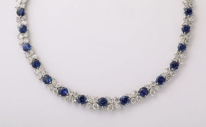 https://a.1stdibscdn.com/blue-sapphire-and-diamond-necklace-for-sale-picture-11/j_415/j_22728952/IMG_1715709012279_master.jpeg?width=768