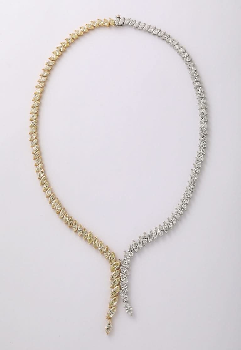 https://a.1stdibscdn.com/yellow-and-white-diamond-marquise-necklace-for-sale-picture-3/j_415/j_225040021712330451429/2P6A1575_master.jpg?width=768