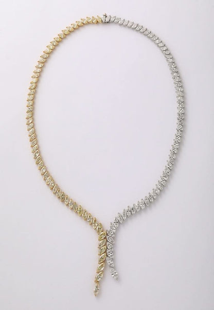 https://a.1stdibscdn.com/yellow-and-white-diamond-marquise-necklace-for-sale-picture-3/j_415/j_225040021712330451429/2P6A1575_master.jpg?width=768