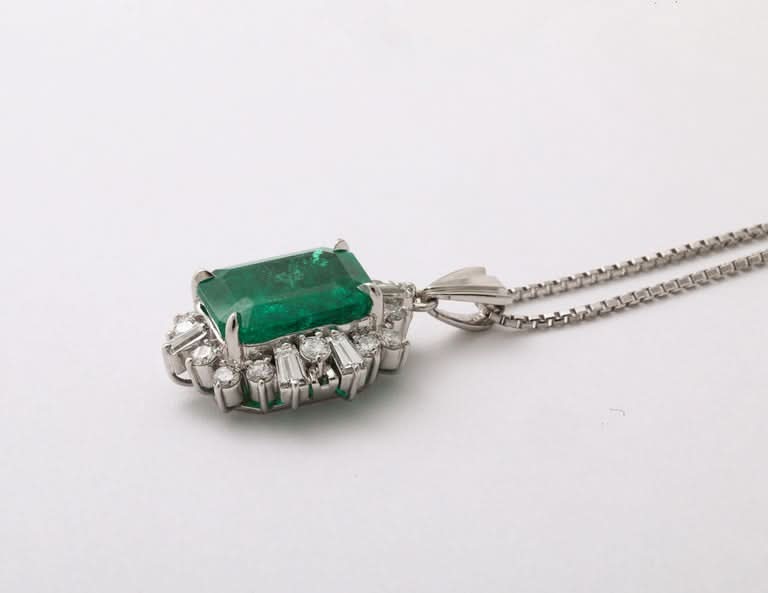 GIA Certified 5.75 Carat Colombian Emerald and Diamond Platinum Pendant