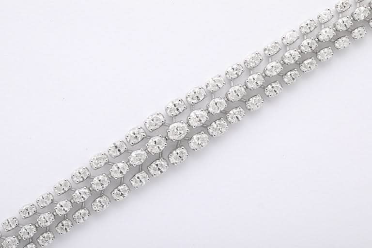 https://a.1stdibscdn.com/three-row-oval-diamond-bracelet-for-sale-picture-5/j_415/j_262309421747144390483/2P6A4467_master.jpg?width=768
