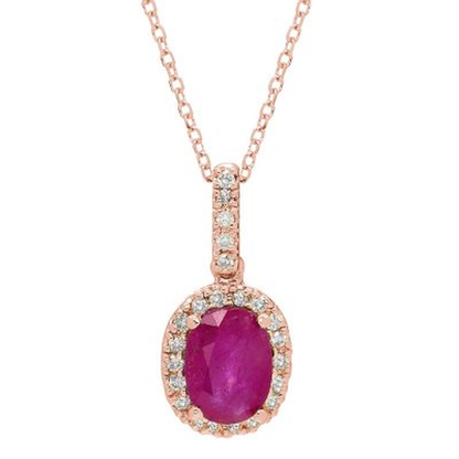 Genuine Ruby and 0.11 CT. T.W. Diamond Pendant in 14K Gold