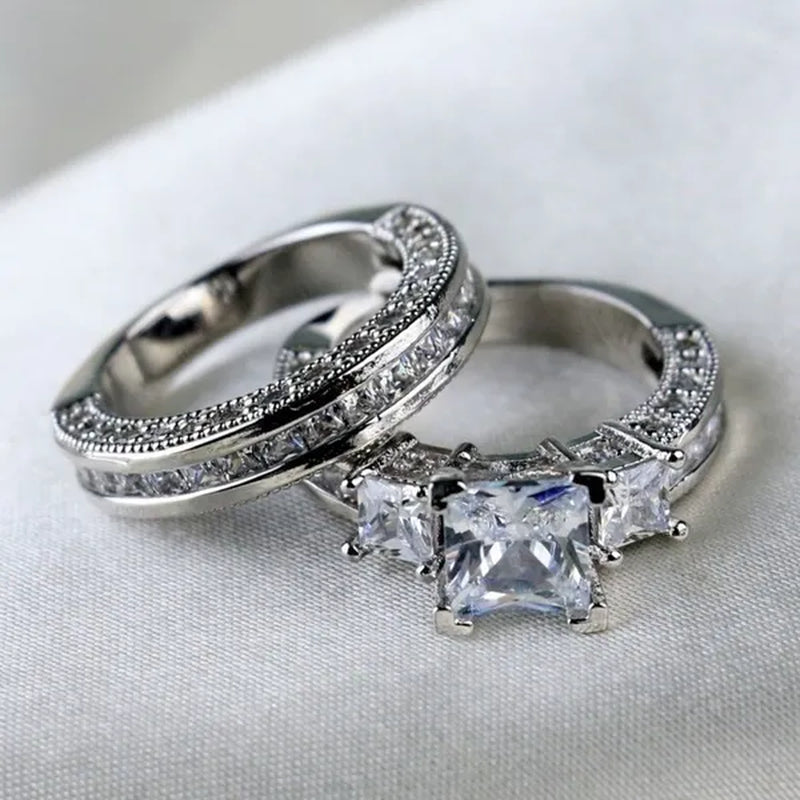 YOHAPP NEW Fashion Couple Rings Set Jewelry - Men's 8mm 316L Stainless Steel Titanium Ring and Women's Three Stone Princess Cut 1CT Diamond   Silver  Bridal Wedding Engagement Band Ring