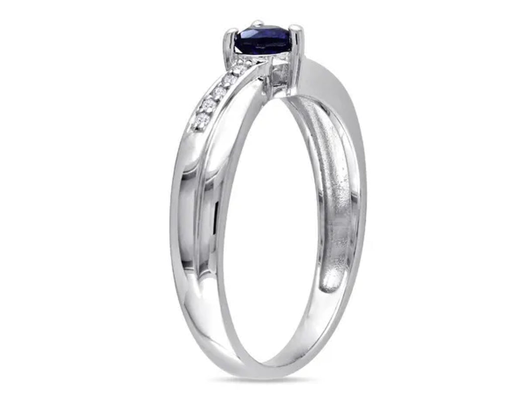 1/4 Carat (ctw) Lab-Created Blue Sapphire Heart Ring in Sterling Silver with Accent Diamonds