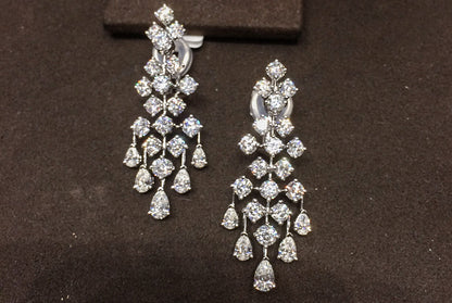 DIAMOND ROUND BRILLIANT SHAPE AND 5 ROW PEAR SHAPE DANGLE EARRING