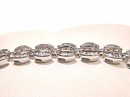 ROUND BRILLIANT BAGUETTE SHAPE DIAMOND CHANNEL SET DIAMOND TENNIS BRACELET