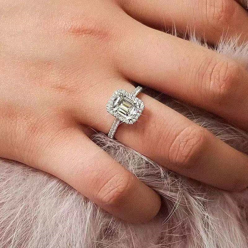 Emerald Cutter Proposes and Engages Moissanite Diamond Ring