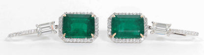 EMERALD 2 EMERALD SHAPE DIAMOND EMERALD SHAPE AND ROUND DROP HALO