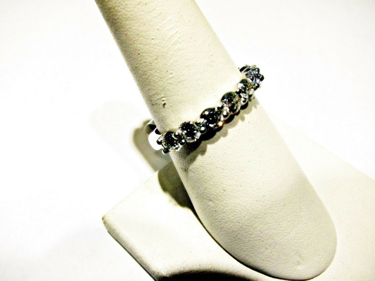 DIAMOND NINE ROUND BRILLIANT COMMON PRONG SET BAND
