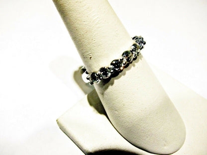 DIAMOND NINE ROUND BRILLIANT COMMON PRONG SET BAND